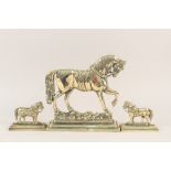 A brass trotting horse doorstop plus a pair of brass horse mantelpiece ornaments