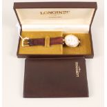 A gents Longines gold plated quartz wristwatch on leather strap in box with paperwork