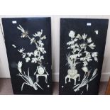 A pair of 19th Century Japanese lacquer panels with high relief bone floral carvings (some losses),