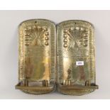 A pair of 19th Century embossed brass double wall sconces