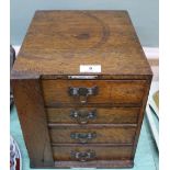 A Victorian miniature oak four drawer Wellington chest