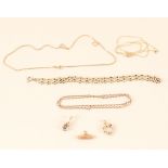 A mixed lot of 9ct gold jewellery including bracelet, three chains (two as found),