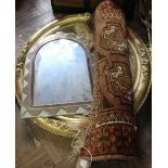 A 19th Century oval gilt mirror,