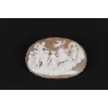 A large cameo brooch with classical scene decoration in yellow metal mount in fitted box