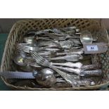 A basket of silver plated cutlery