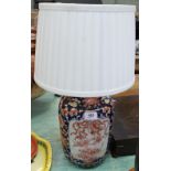 An Imari floral and dragon table lamp