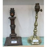 An Edwardian bronzed brass table lamp decorated with cherubs plus a weighted brass table lamp