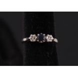 An 18ct white gold sapphire and diamond ring,