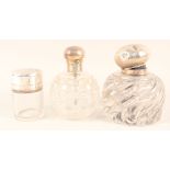 A silver topped cut glass scent bottle,