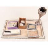 A mixed silver lot including a large photo frame, two small photo frames,