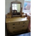 An Edwardian pine three drawer dressing chest