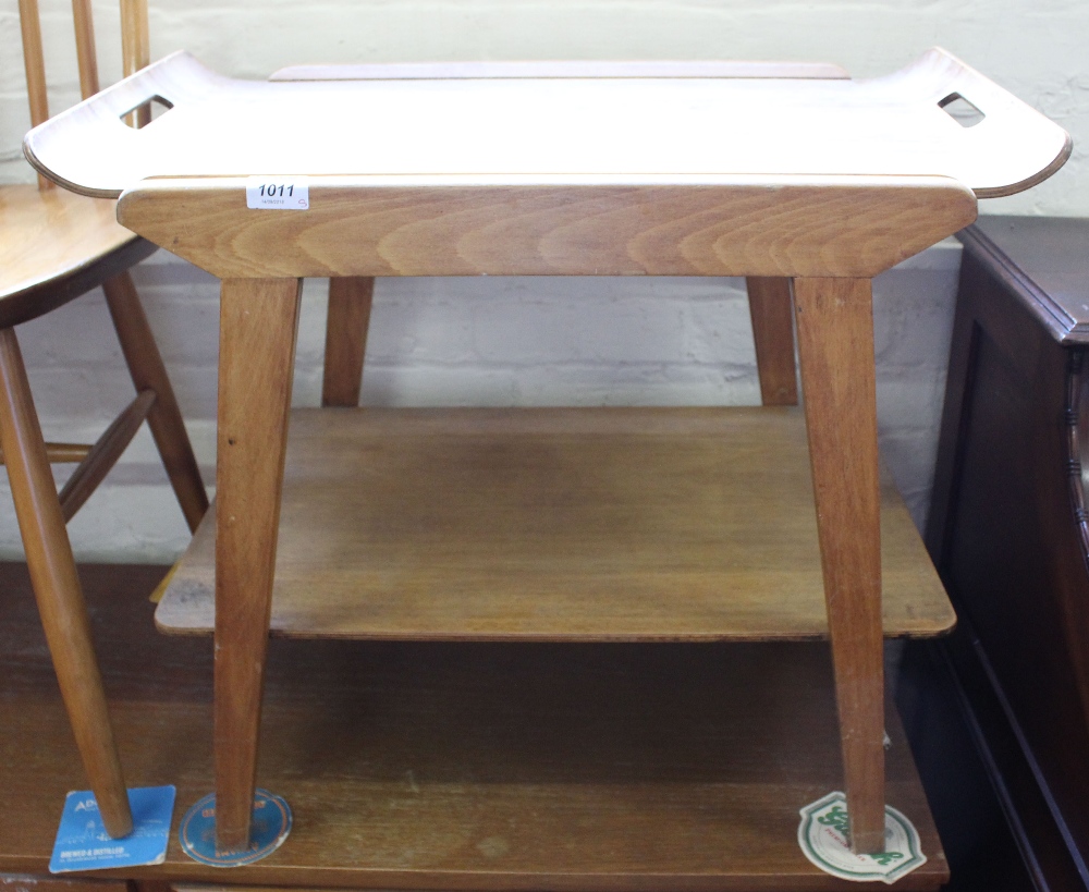 A vintage teak tea table with detachable tray, two stools,