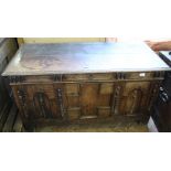 An 18th Century carved oak coffer with split bobbin turned mouldings