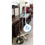 A 1960's chrome and yellow plastic coat rack and free standing angle poise medical magnifying glass