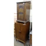 An Edwardian oak pot cupboard and record cabinet with contents