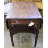 A 19th Century mahogany drop leaf table with single drawer and under tier