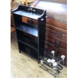 A dark oak Arts and Crafts style free standing bookcase,