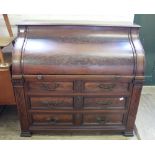 A 19th Century mahogany cylinder desk with Rococo style hardware