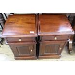 A pair of French mahogany bedside cabinets with single drawer over one door and brass knobs
