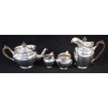 A four piece silver tea set by Reid & Sons,