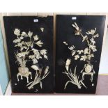 A pair of 19th Century Japanese lacquer panels with high relief bone floral carvings (some losses),