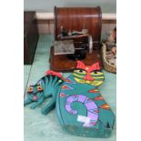 A 'lead' childs sewing machine plus two painted wooden cats