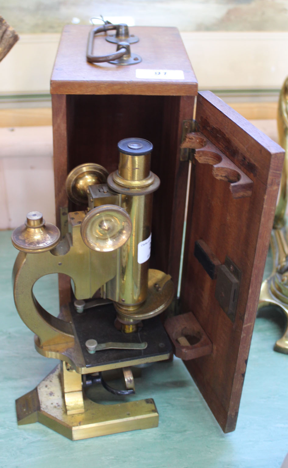 A cased brass Beck London microscope