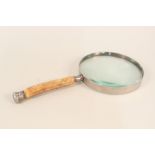 A large silver mounted antler handled magnifying glass