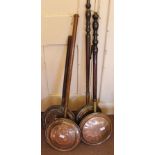 Four Victorian copper and brass warming pans