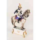An Italian porcelain figure of a Napoleonic soldier