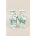 A pair of Chinese green landscape decorated vases