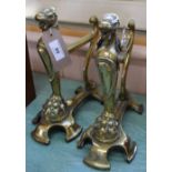 A good quality pair of 19th Century brass Griffin fire dogs,