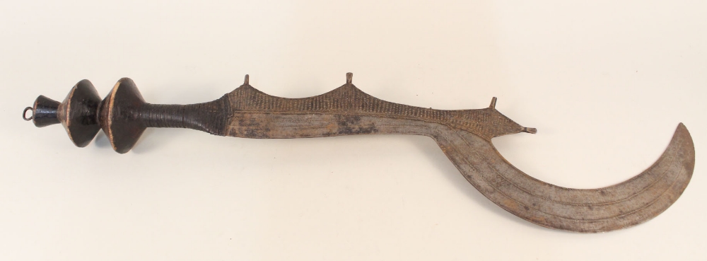 A Ngala sword from Zaire with sickle shaped blade,