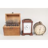 A wooden carriage clock,