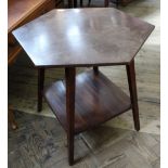 A hexagonal mahogany occasional table with square under tier