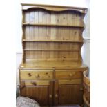 A modern pine two drawer,