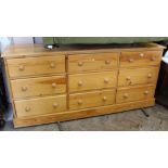 A pine chest of nine drawers