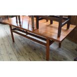 A large rectangular teak coffee table