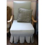 A 1940's pale blue upholstered wooden armchair