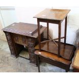 An Edwardian treadle operated Singer sewing machine housed in a wooden chest of drawers,