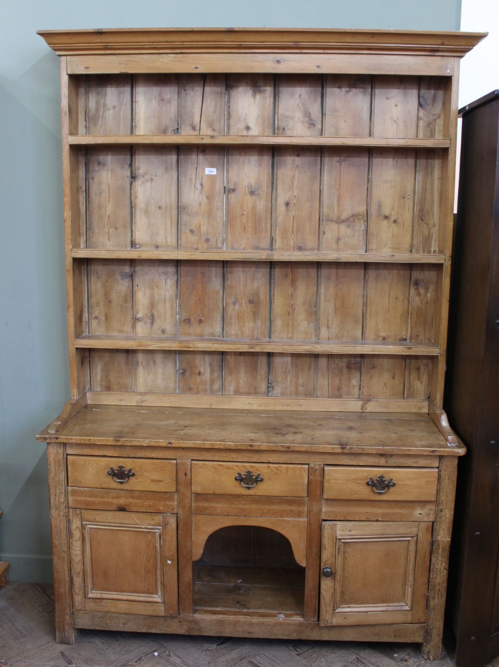 A 19th Century shelf back "dog kennel" dresser