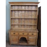 A 19th Century shelf back "dog kennel" dresser