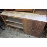 A vintage teak small three door cupboard with two doors and adjustable bookshelves