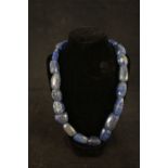 A large rough cut lapis lazuli necklace