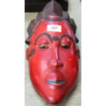 A Baule painted wood mask