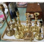 Various Victorian brass candlesticks plus two lamps