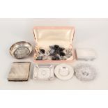 Two silver cigarette cases (as found), two silver pin dishes one inset with coins,