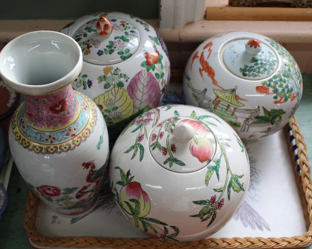 Three modern Chinese lidded jars plus a vase