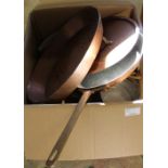 Copper and brass saucepans,