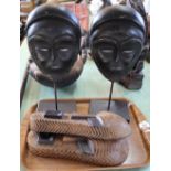 Two African plus two other wall masks